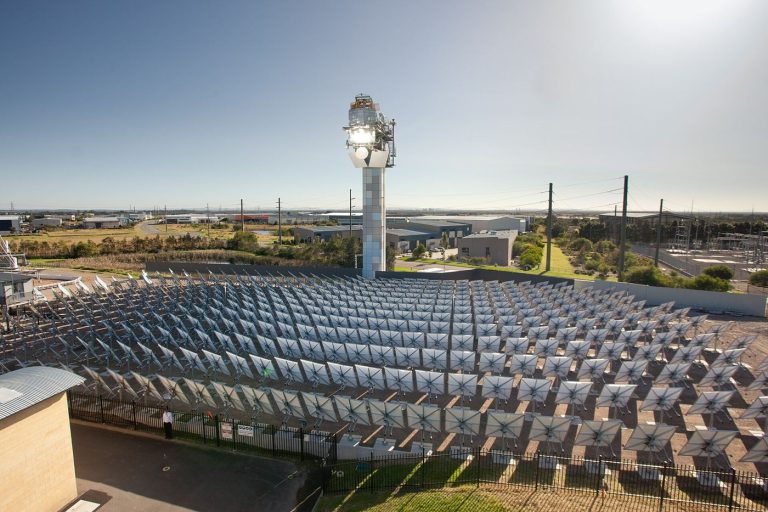 Bitcoin Miners Sell Grid Flexibility Alongside Hashing Solar panels in a field