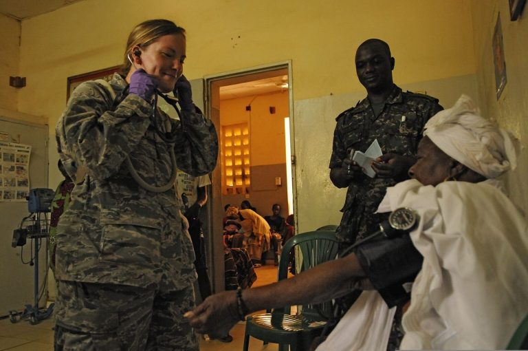 Blood Pressure Checks Move Into Everyday Places nurse checking a patient's blood pressure